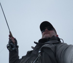 Biting the lip as a fish is brought in Biting the lip as a fish is brought in