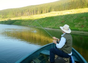 Ron fighting a Rainbow Trout