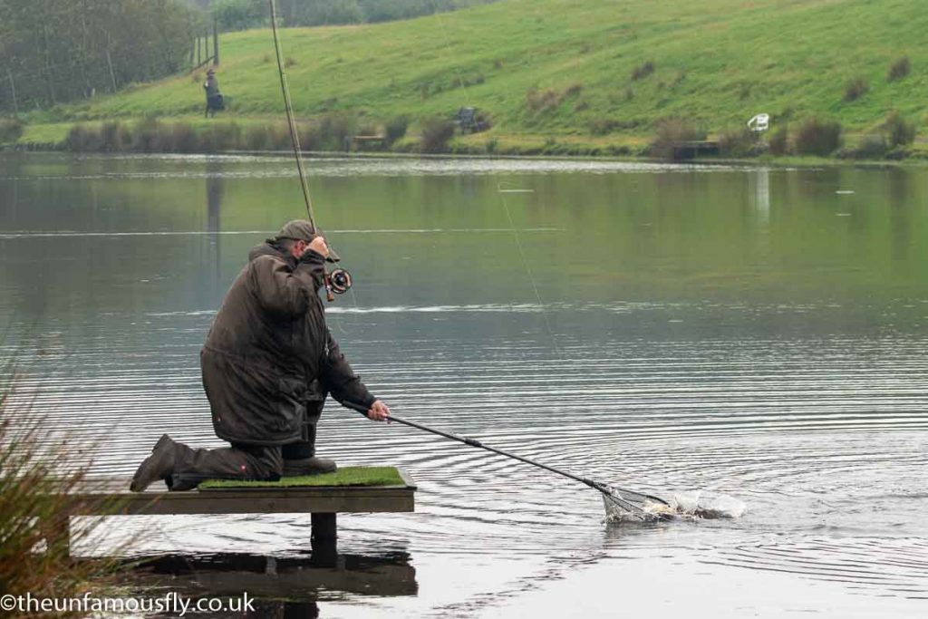 Bill Campbell netting a fish