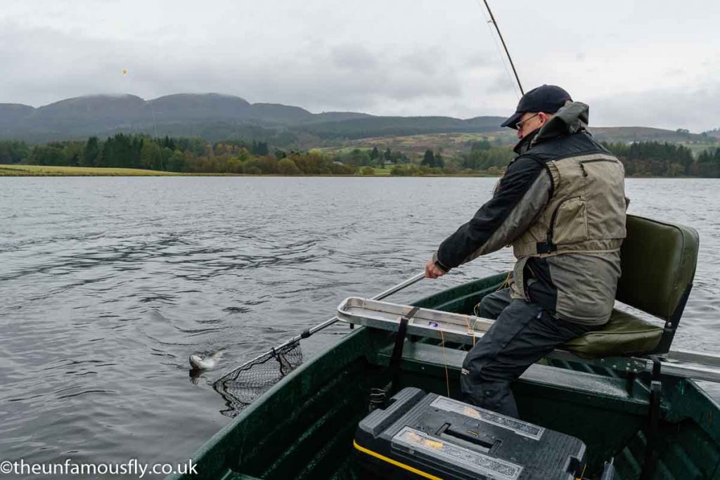 Pete netting a fish