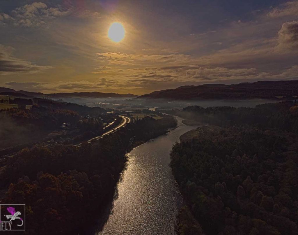 A cold looking sun over the Tummel with mist still hugging the sides of the Tay Valley