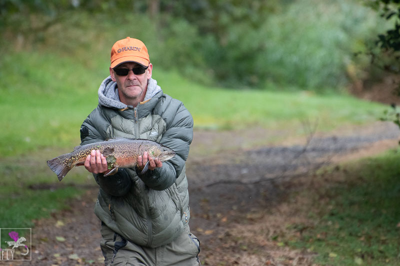 Stevie with a nice Tiger Trout